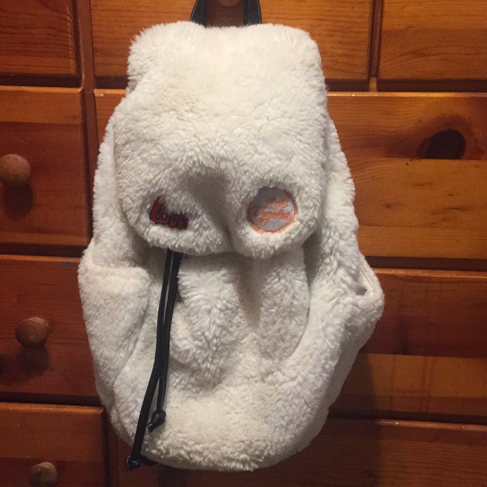 A fluffy drawstring book bag